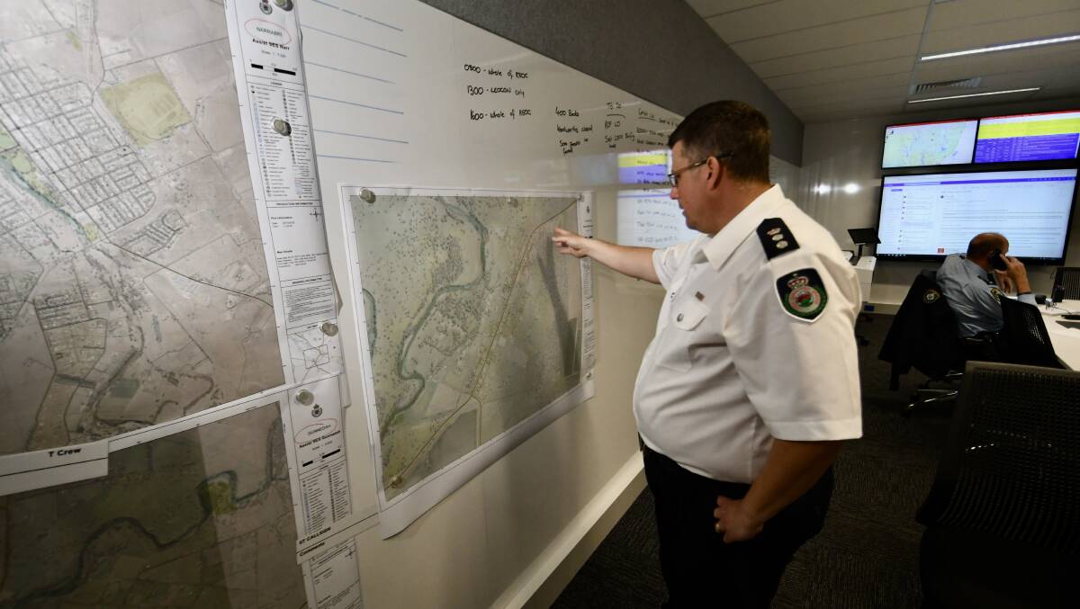 RFS North West area chief superintendent commander Heath Stimson at the new control centre in Tamworth is helping to co-ordinate flood operations. Picture by Gareth Gardner.