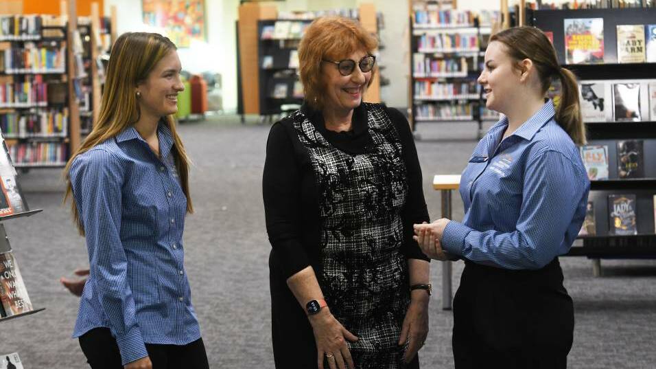 Former members of the Tamworth Regional youth council, Elle Woods and Chloe-Lee Opie, were involved in the push for after-hours access to Peel Street library, with manager of cultural and community services Kay Delahunt. Picture by Gareth Gardner from file.