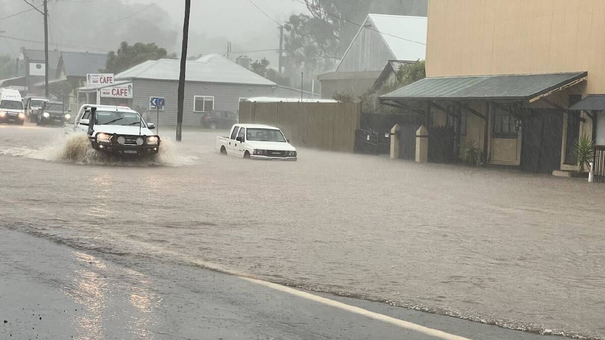 Flash flooding on the New England Highway at Willow Tree on Monday afternoon. Picture supplied to the Leader