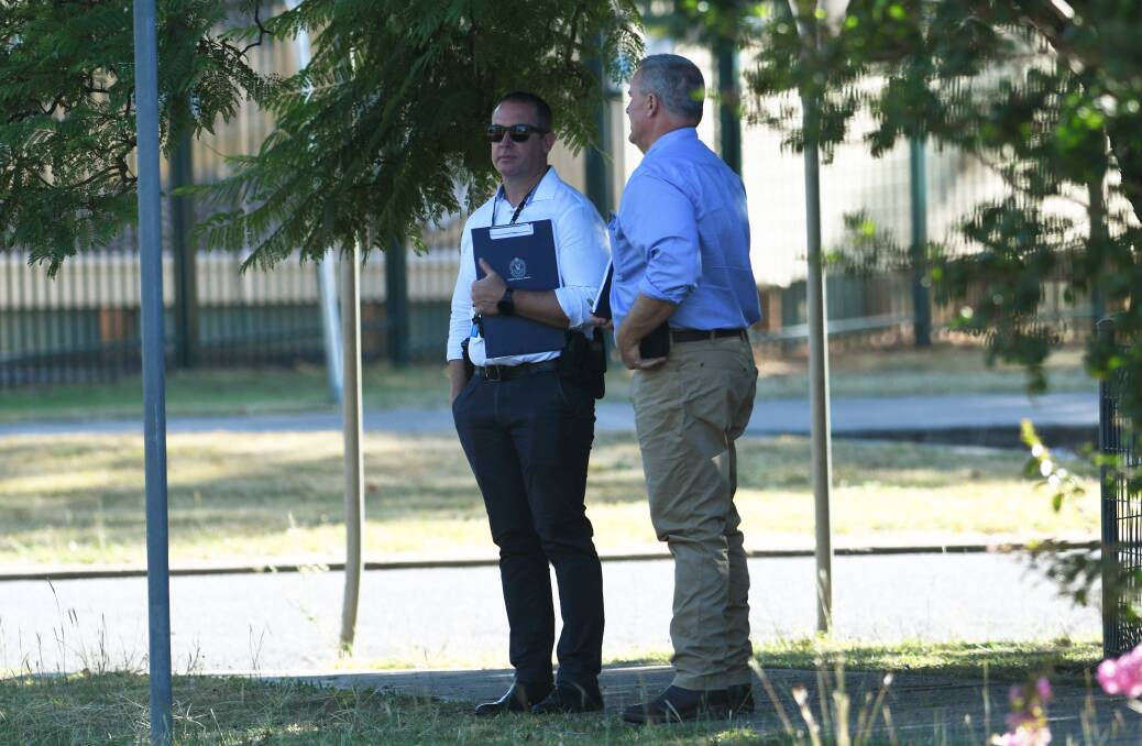 Robbery squad detectives combed the scene for clues after the alleged violent home invasion in Tamworth. Picture by Gareth Gardner