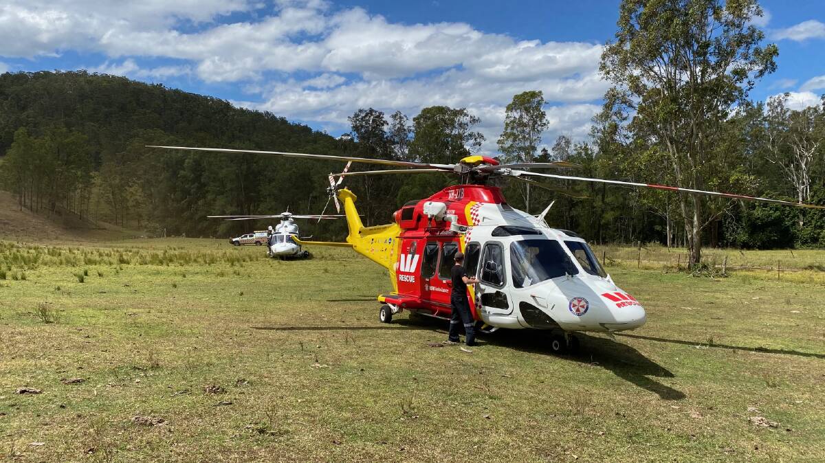 The Westpac Rescue Helicopter, with the Toll Ambulance helicopter at the property in the Barrington Tops on Wednesday afternoon. Picture supplied by WRHS
