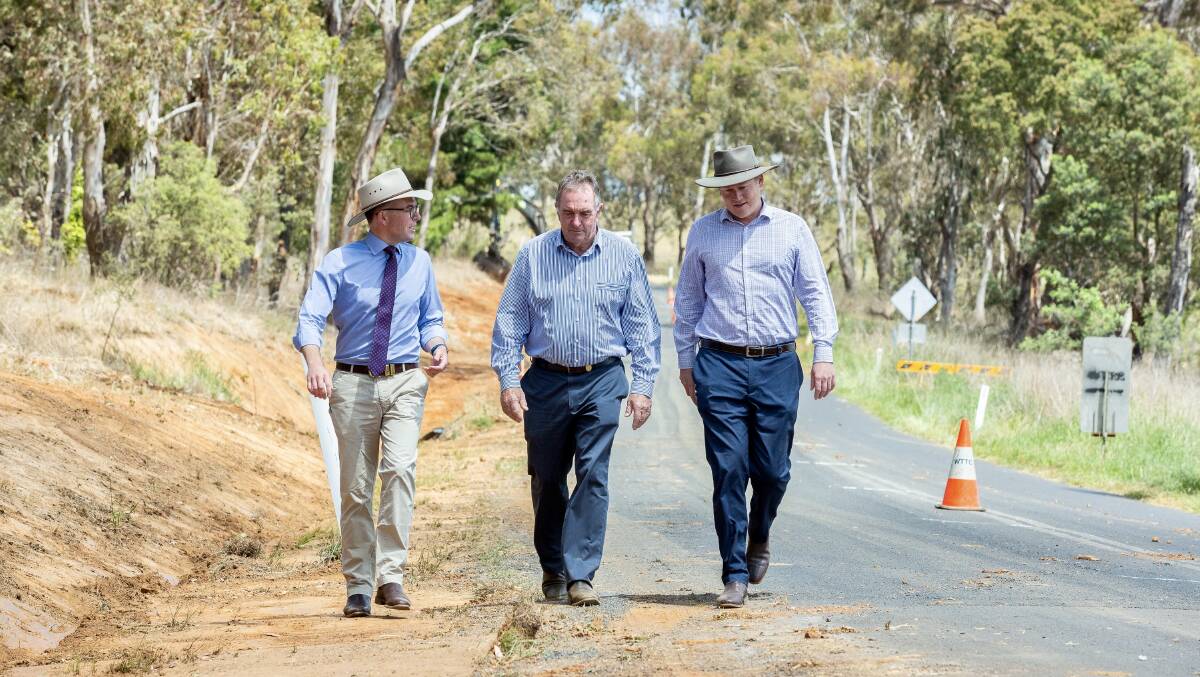 From left Northern Tablelands MP Adam Marshall, Walcha Mayor Eric Noakes and
General Manager Phil Hood inspect roadworks on Aberbaldie Road, just out of Walcha.