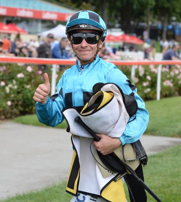 THUMBS UP: Jockey Ben Melham, pictured at Moonee Valley in December last year, was happy with She Will Reign's trial on Monday. Photo: Mal Fairclough