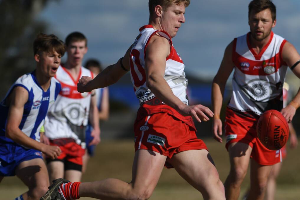 NAILBITER: Connor Betts fires up the Swans' offence in a derby classic against the Roos at Riverside 5. Photo: Gareth Gardner