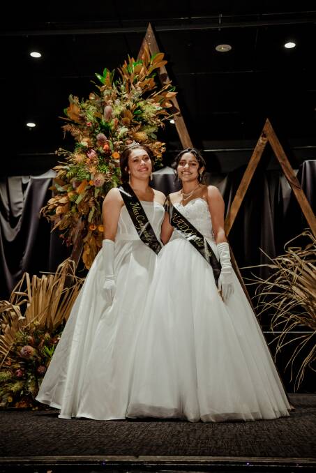 Johnson, right, is crowned Mrs NAIDOC at the 2022 debutante ball. She is joined by Miss Congeniality Yvonne Sutton. Picture supplied