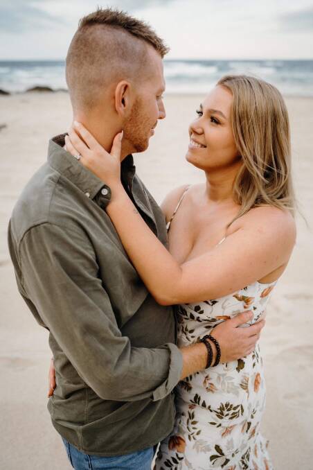 The couple's engagement photo session was held at Shelly Beach, Port Macquarie. Picture by The Photo Trail
