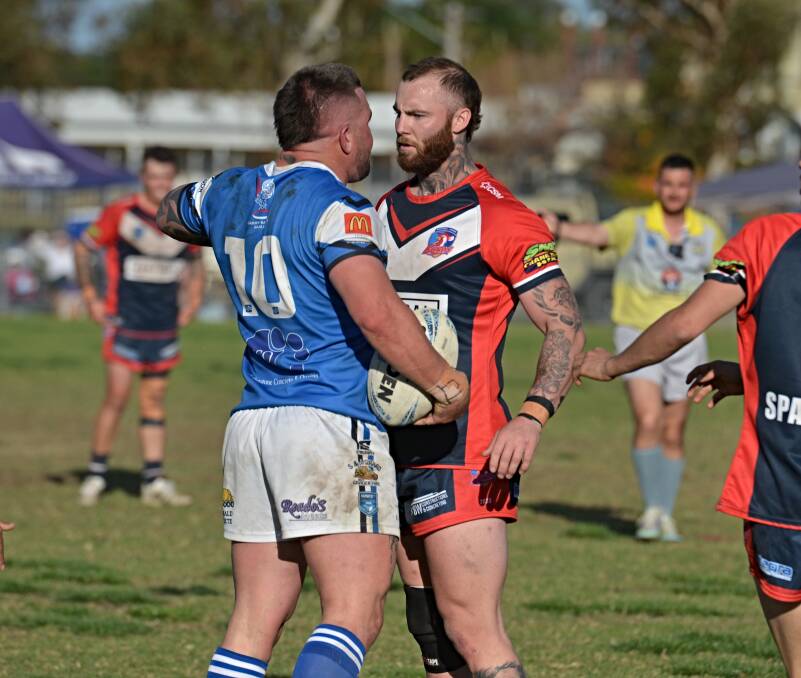 Daniel Jobson, left, and Ryley Mackay square off in the preliminary final at Boughton Oval. Picture by Mark Bode