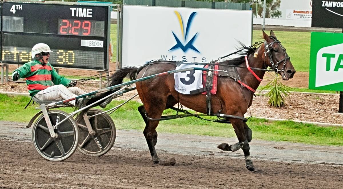 Travis Bullock steers Leah Shannon to victory in a race named in honour of his late mother, Joan. Leah Shannon is trained by his father, Peter. Picture by PeterMac Photography