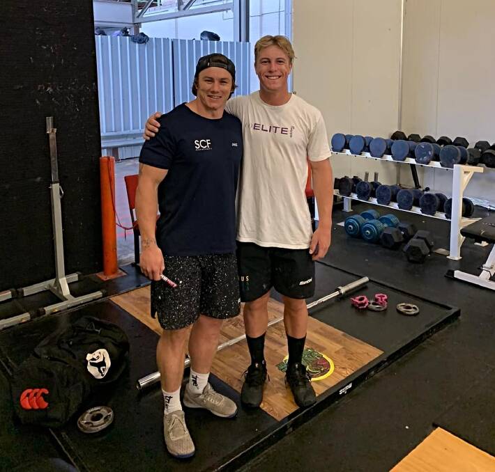 Jake Douglas, left, and Jack Davis work out at Snake Athletic in October, 2022. Picture supplied