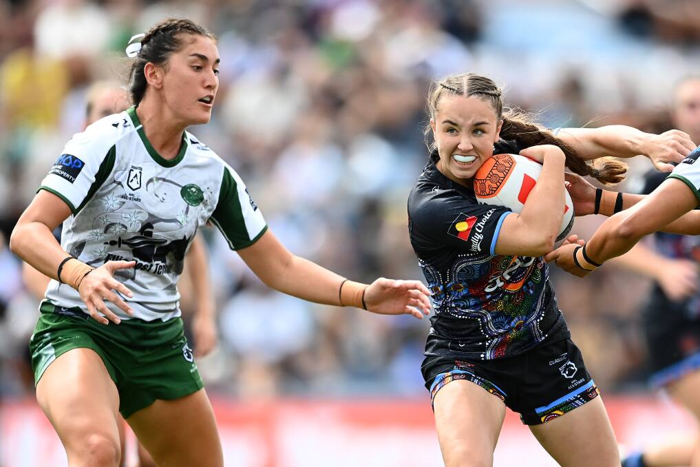 Jada Taylor inserts herself into the action playing for the Indigenous All Stars. Picture by Hannah Peters/Getty Images