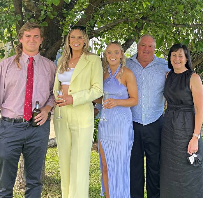 Tibbs (centre) with Mitchell and her brother, Will, and her parents, Robert and Joanne. Picture supplied