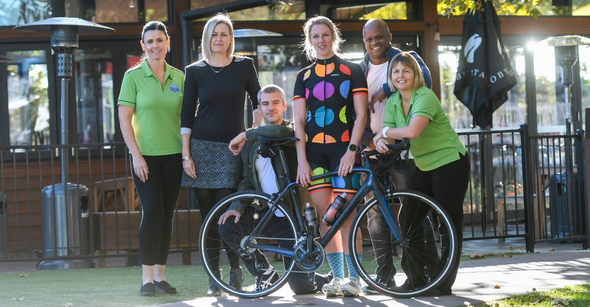 SUPPORT CREW: Nadine Ison, of race sponsor Happy Smiles, Airlie Horton, of Tamworth Cycle Club, Jay Lynch, co-owner of race sponsor Hopscotch Restaurant & Bar, Pip Ash, of TCC, Dwone Jones, co-owner of Hopscotch, and Marcella Blundell (Happy Smiles).