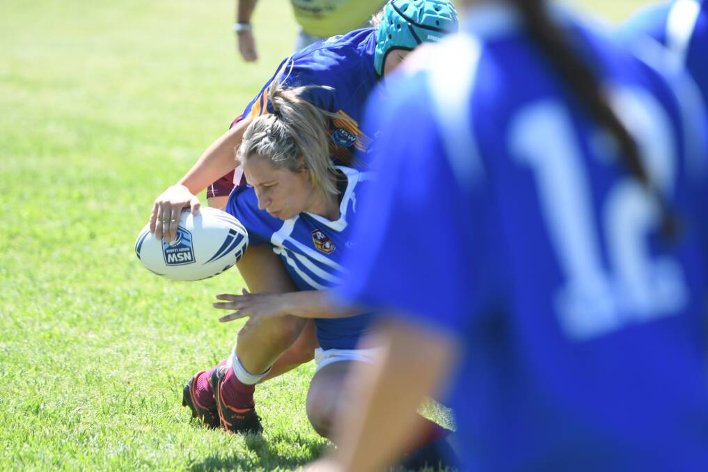Sarah Stewart scores the first try of the inaugural Northern Tigers women's rugby competition.