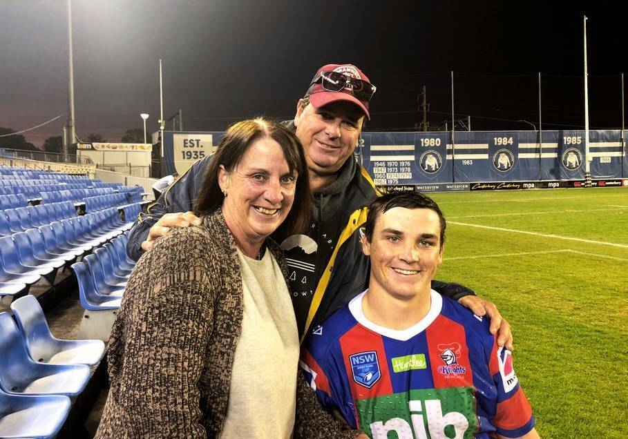 Cameron and his parents, Mary-Ann and David, following at match at Belmore Sports Ground in Sydney. Photo: Supplied