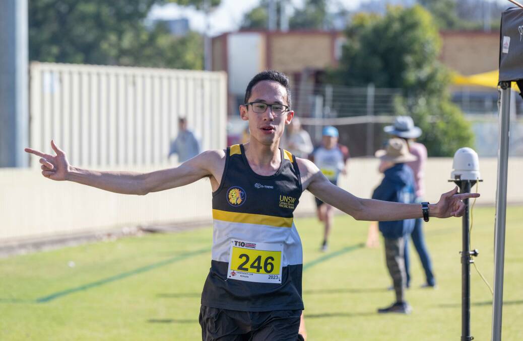 Chung celebrates his 10km win at the Tamworth Running Festival. Picture by Peter Hardin 