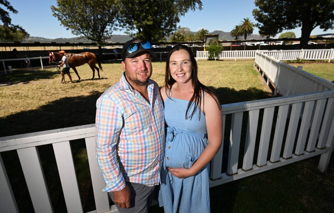 Lochie Collins and his fiancee, Sarah Rayner, attend the Cowboys' season launch at Tamworth Racecourse. Picture by Gareth Gardner