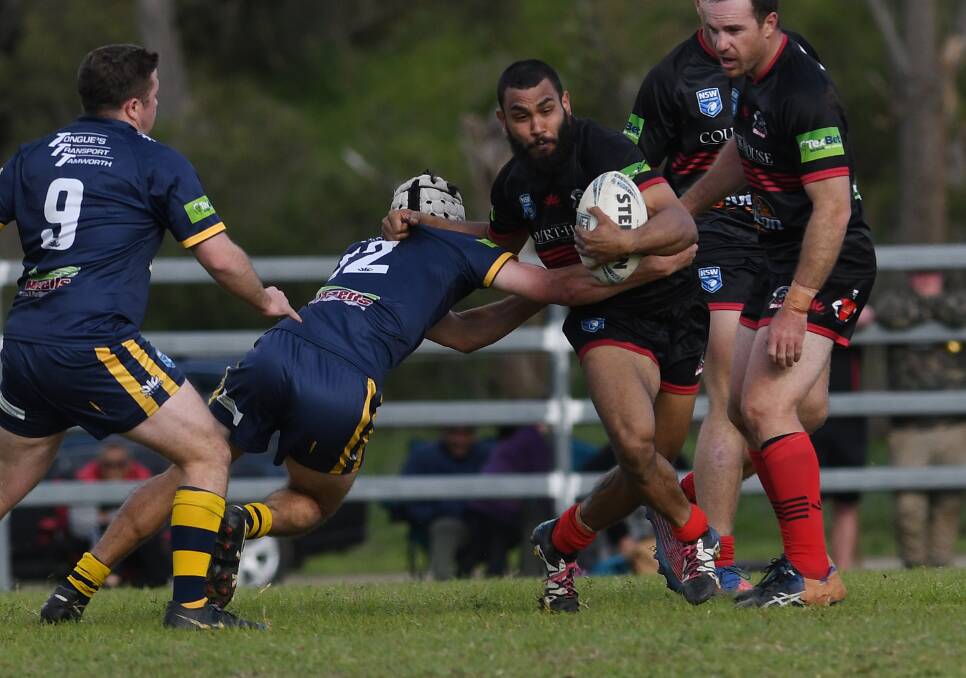 Jaffer-Williams looks to hurt Dungowan in the grand final. Picture by Gareth Gardner