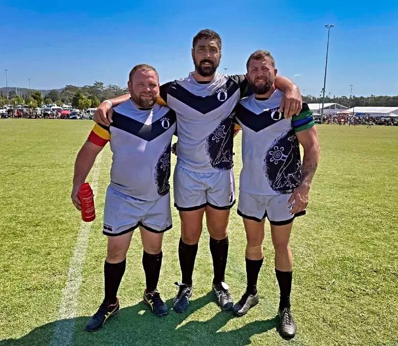 Tom Lahrs, centre, is joined by Luke Brynes, left, and Brock Wadwell at the 2023 Koori Knockout. Picture supplied