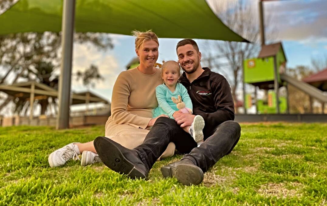 The Joneses - Josh, Georgia and Mila - chill at Anzac Park. Picture by Mark Bode