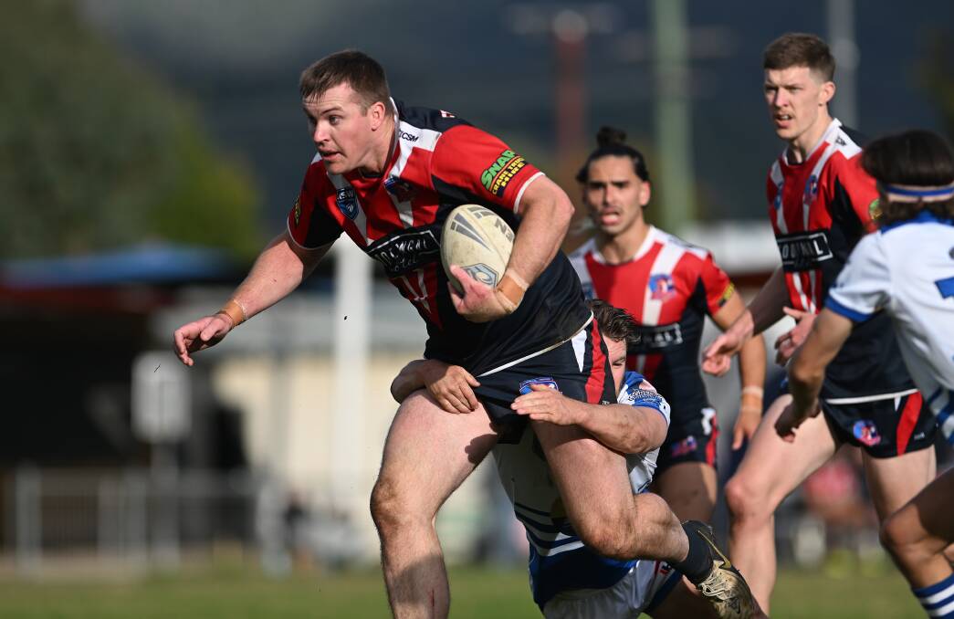 Roosters skipper Logan Howard takes on the Boars' defence. Picture by Gareth Gardner