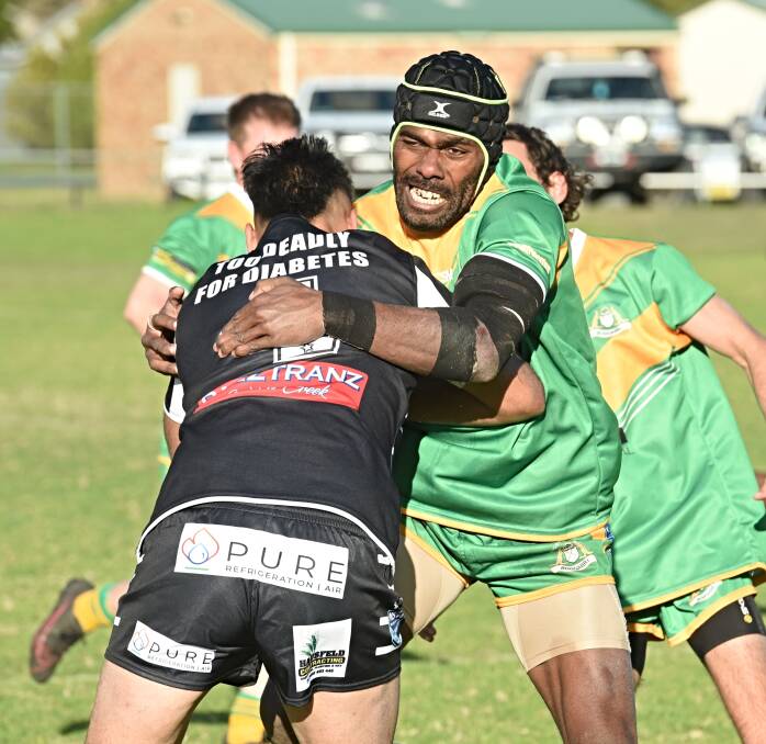 Roos centre Ilaisa Kalokalodrau collides with his opposite number, Kaidyn Saunders. Picture by Mark Bode