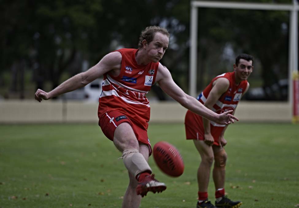 Small and his Swans en route to beating the Kangaroos at No 1 Oval last round. Picture by Mark Bode