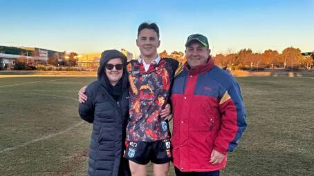 Charlie Henderson is joined by his parents, Lynette and Peter, after his Gungahlin Bulls beat the West Belconnen Warriors 22-12 at Gungahlin Enclosed Oval on July 6, 2024. He was man of the match. Picture supplied