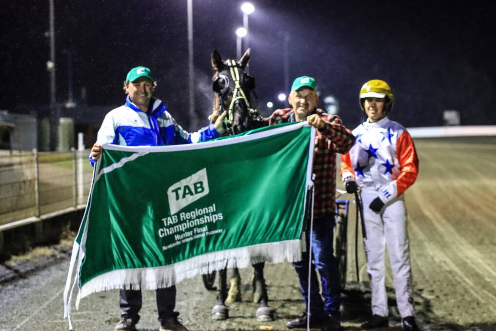CLASS ACTS: Trainer Clayton Harney (left) and driver Jack Callaghan after Kanye Crusader won the Hunter Region Championships final at Newcastle. Photo: Coffee Photography 