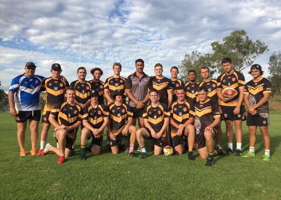 Bone (front row, third left) and Tom Lahrs (back row, centre) with the 2020 Northern Tigers under-18 squad.
