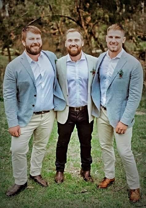 Lewis (right) with his brothers Mat and Mark. Picture supplied