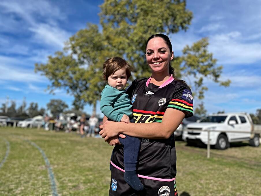 Cruickshank nurses her cousin, Joey Stanford, after a loss to Werris Creek at Wee Waa on Sunday, July 7. Picture by Mark Bode
