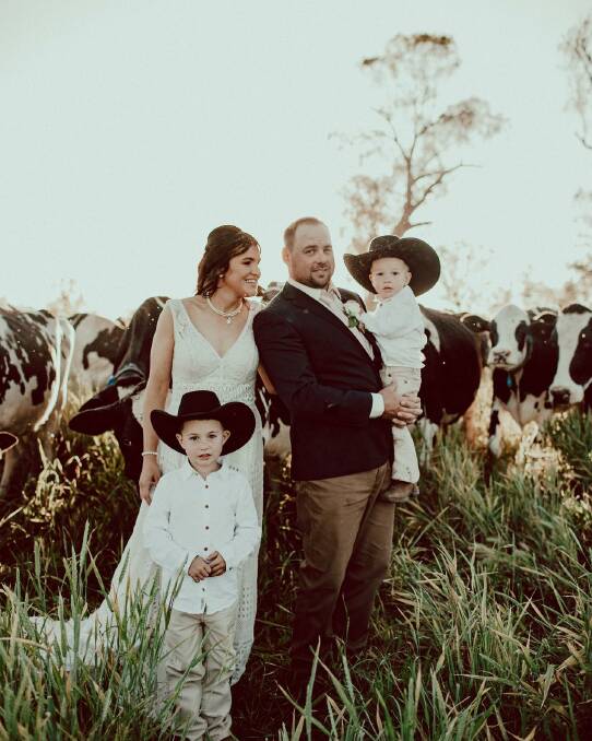 The happy couple with their children, Braxton, 6, and Huxley, 1. Picture by Lilly at Dawn Photography 