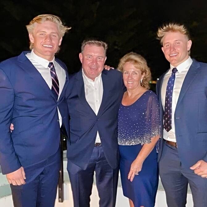 Mitch Watts (left) with his mum and dad, Debra and Stuart, and his elder brother, Nathan. Photo: Facebook