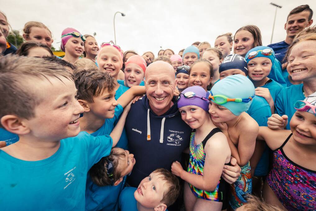 Tamworth City Swimming Club coach Nicolas Monet feels the love. Picture by Andrew Pearson Photography