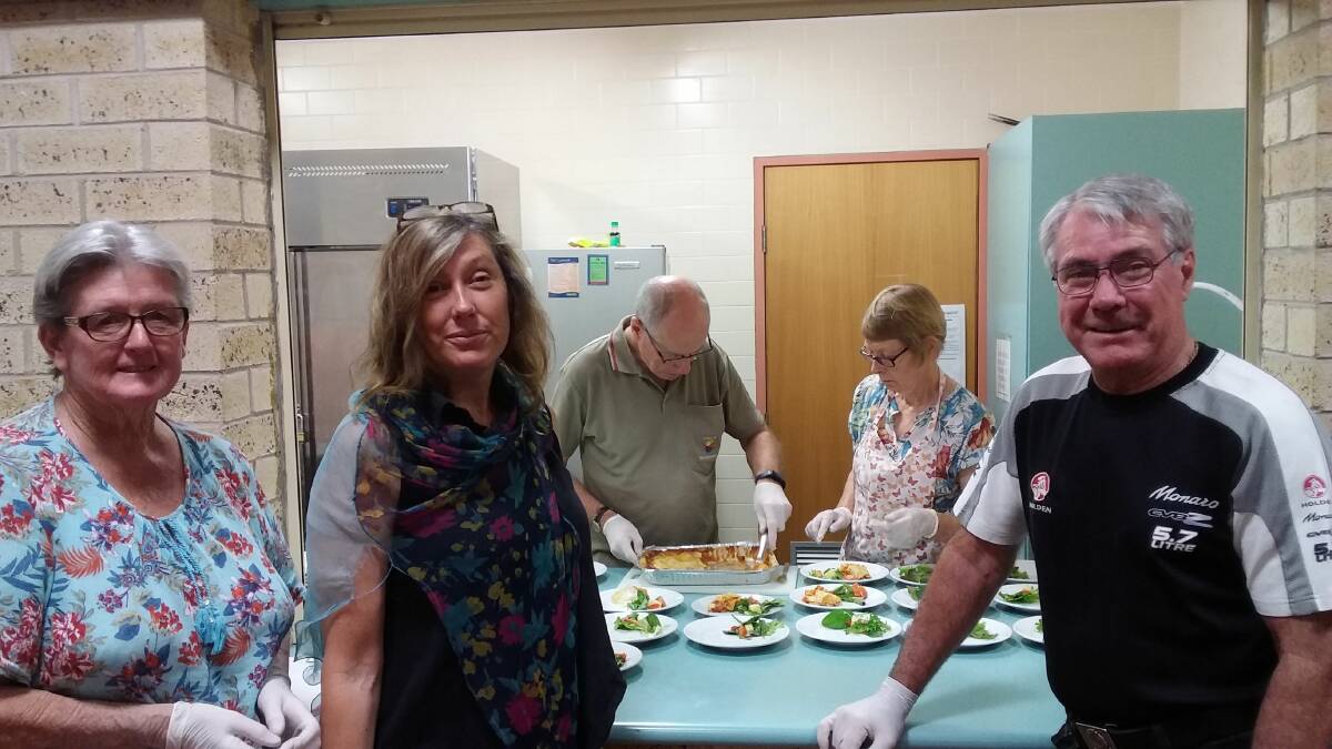 Helpers at work at Cornerstone Kitchen: Sandra Tynan, Julie Collins, Bill and Jean Holder and Gavin Campbell.
