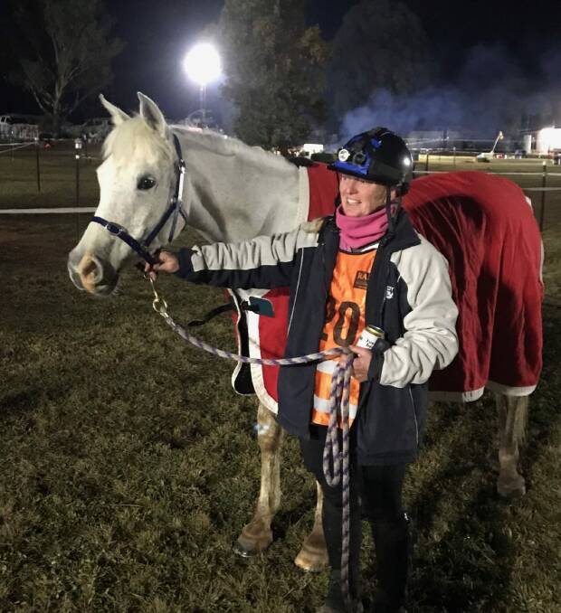 'VERY, VERY SWEET': Jo Bailey and Honeymoon at the end of a tough day's riding at the Tom Quilty national championship event. 