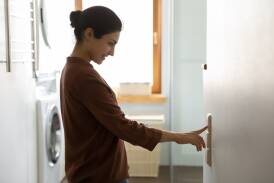 Save energy by turning off the laundry lights and only use the washing machine for full loads. Picture Shutterstock 