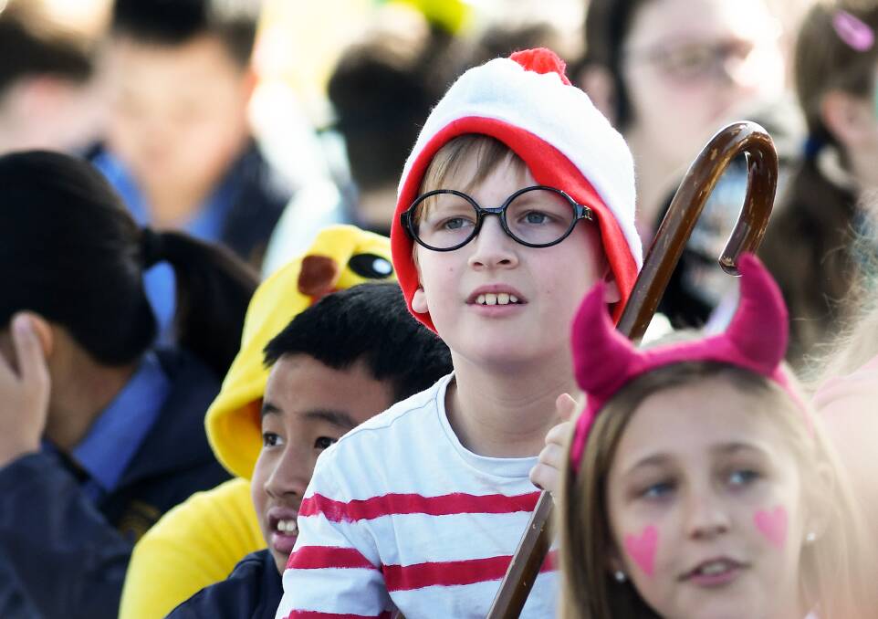 Students and teachers at St Joseph's Primary School show off their costumes for Book Week. Pictures by Gareth Gardner