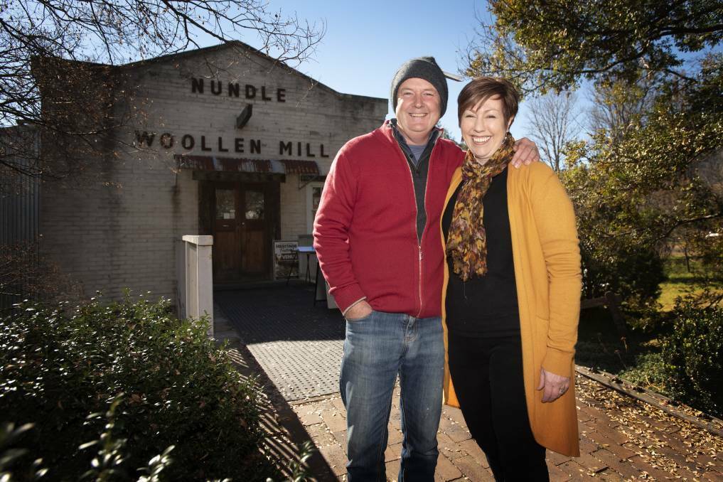 Nick and Kylie Bradford of Nundle Woollen Mill, pictured preparing to welcome tourists for the snow season, which also draws crowds. File photo