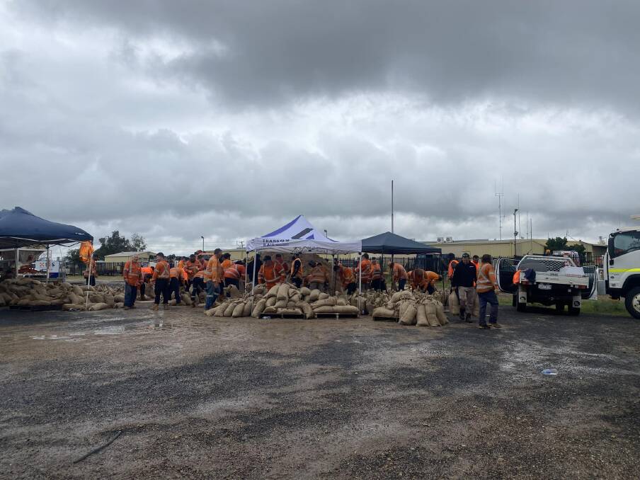 Crews getting sandbags ready as Moree braces for more flooding after torrential rain. The collection point is at Moree SES in Maude Street. Picture by Moree SES