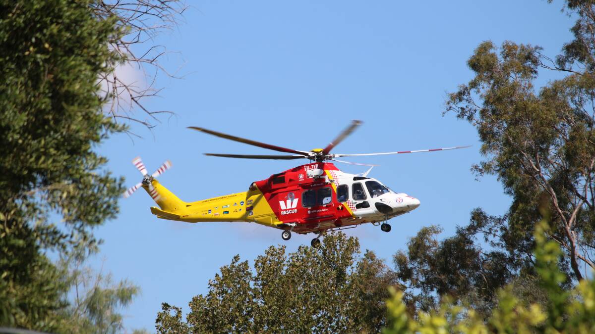Rescue helicopter flies woman with eye injury out of flooded Wee Waa