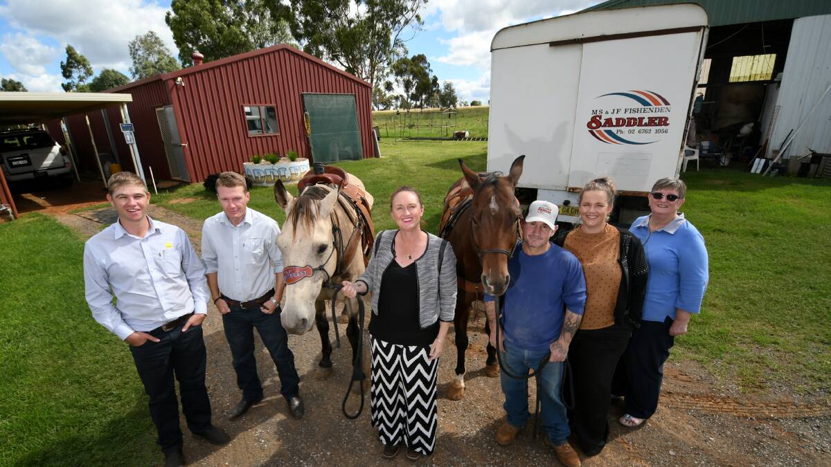 FUNDRAISER. Baden Chaffey and Riley Gibson both of Ray White with Lorrayne Fishenden, Wade Fishenden, Makishia Felton and Ros Riggs. The team hopes to raise thousands to fight motor neuron disease. Photo: Gareth Gardner