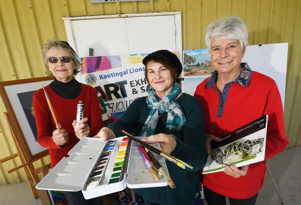 Kootingal art show organisers Mary Attard, Julie Attard and Lee Rodger are organising aid for Lismore artists who were hard hit by floods earlier this year. Picture by Gareth Gardner 