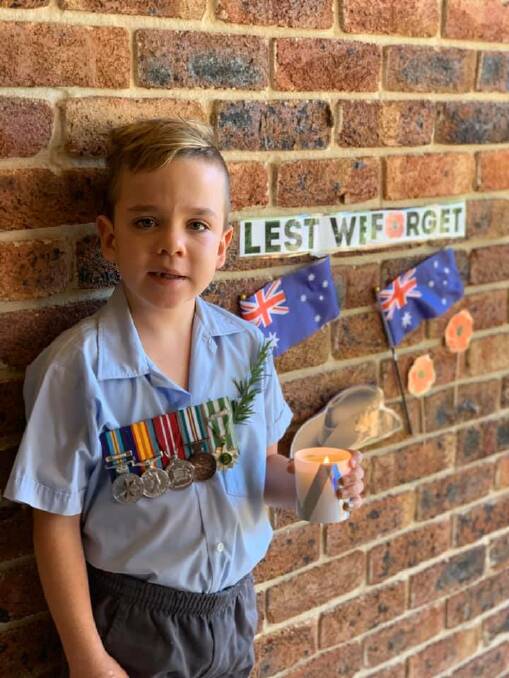 NEVER FORGET: Tamworth's 2020 Anzac Day became a dispersed, community-led event, with all centralised services cancelled. Eddie Ashford commemorated the day last year. Photo: Katrina Ashford
