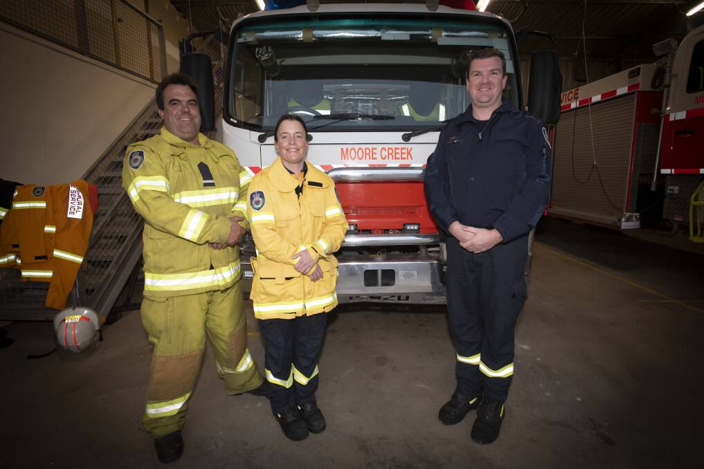Emma Rust, Robert Gill and Tim Guest at the Moore Creek RFS brigade are hoping the event will help fund new firefighting equipment. Picture by Peter Hardin 