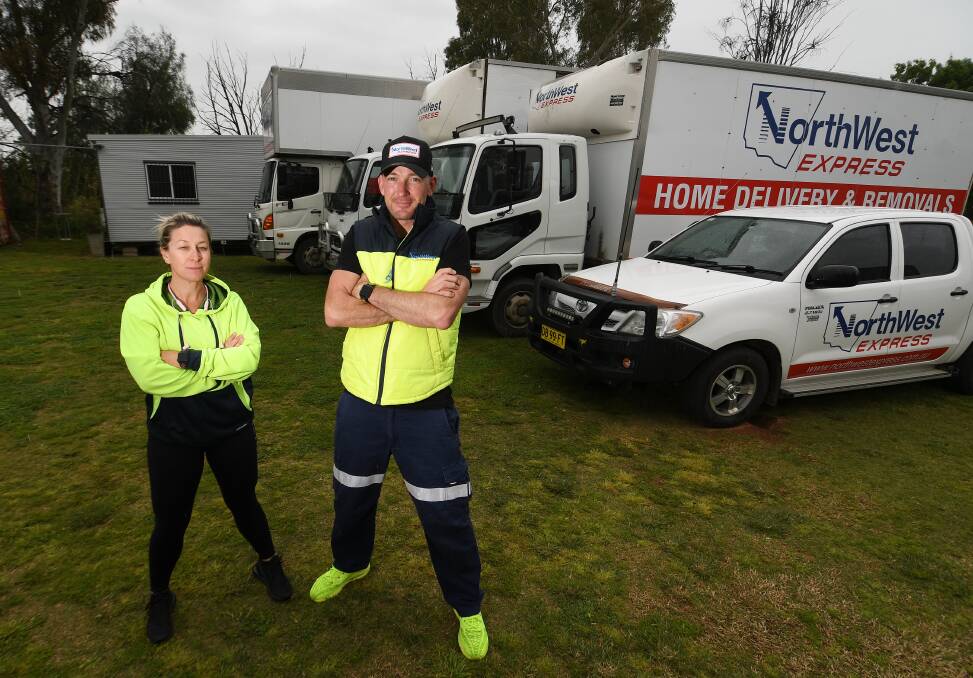 Kellie Tulacz and Ben Griffiths from Northwest Express Tamworth said they will have no choice but to pass the extra cost onto customers. Picture by Gareth Gardner
