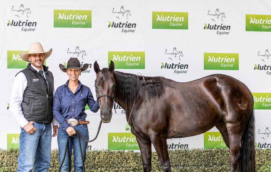 SUPER SALE: Auctioneer Joel Fleming and seller Holly Clayden with record-breaking mare BAD IN BLACK, which sold for $550,000. Photo: Penwood Creations