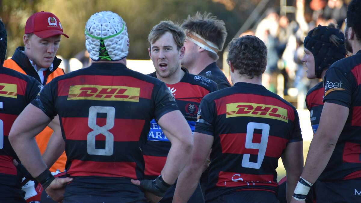 Norths skipper and five-eight Angus Sinclair addresses his troops after conceding a try on Saturday at Cowra.