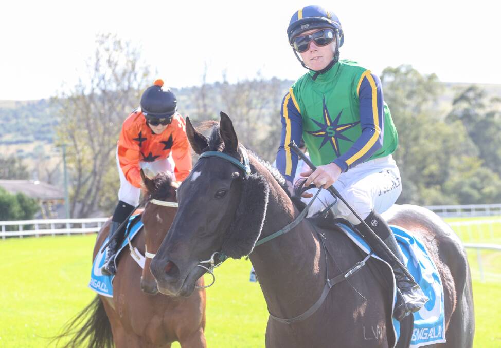 What a win: Jackson Searle on Just Jacky (right) after their nailbiting win in Muswellbrook earlier today. Photo: Bradley Photos. 