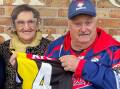 Brian Lenton, a lifelong Richmond Tigers fan, is emotional alongside Deb Naismith with the signed Dustin Martin jersey on Saturday. Picture supplied.